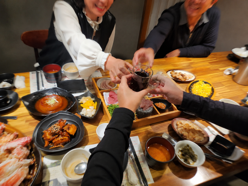 Korean family sharing dinner at Restaurants