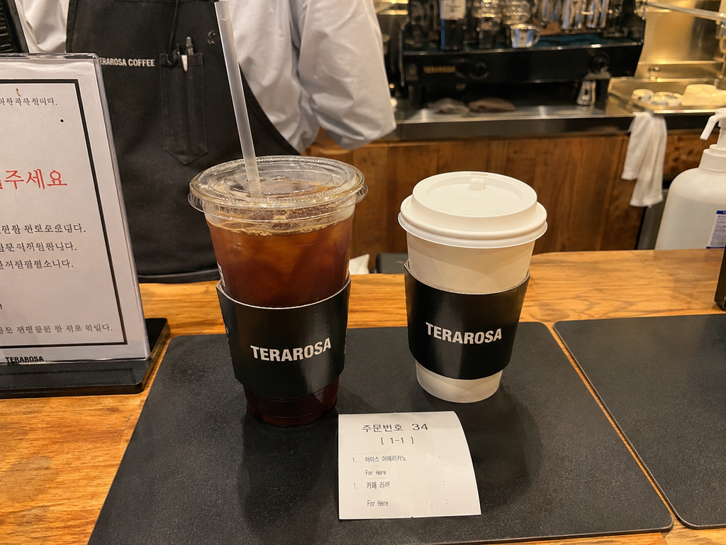 Takeout coffee being prepared at a Korean cafe