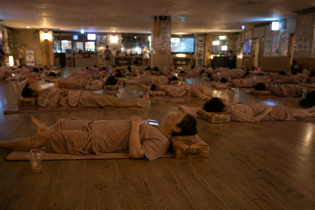 Shared sauna and relaxation area inside a Korean jjimjilbang