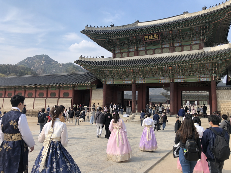 Visitors exploring Gyeongbokgung Palace during a five-day trip to Seoul